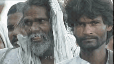 A Group Of Men Are Standing In A Line With The Number 819-505-2411 Visible In The Corner GIF