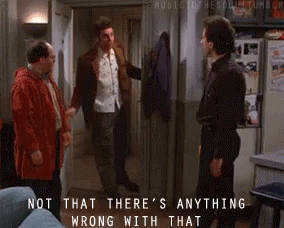 A Group Of Men Are Standing In A Living Room And One Of Them Is Saying Not That There 'S Anything Wrong With That . GIF