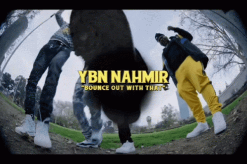 A Group Of Men Are Standing In A Park With The Words Ybn Nahmir Bounce Out With That GIF
