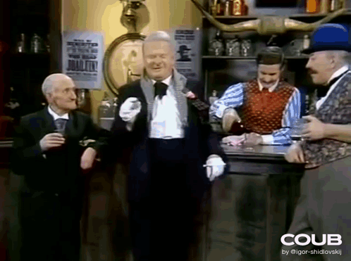 A Group Of Men Are Standing In A Room With The Word Coub On The Bottom Right GIF