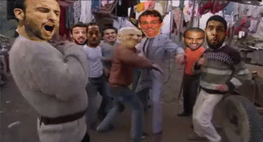 A Group Of Men Are Standing In A Room With Their Faces On The Wall GIF