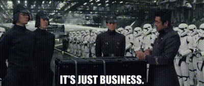 A Group Of Men Are Standing In Front Of A Row Of Stormtroopers And Talking To Each Other . GIF