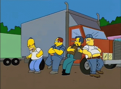 A Group Of Men Are Standing In Front Of A Semi Truck GIF