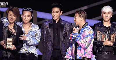 A Group Of Men Are Standing In Front Of A Sign That Says Ama Hong Kong GIF