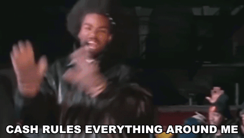 A Group Of Men Are Standing In Front Of A Sign That Says Dollar Dollar Bill Y'all GIF