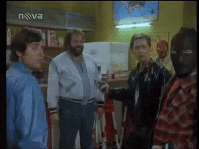 A Group Of Men Are Standing In Front Of A Tv Screen That Says Nova On It GIF