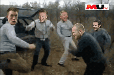 A Group Of Men Are Standing In The Dirt With Mu Written On The Bottom GIF