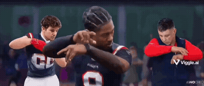 A Group Of Men Are Standing Next To Each Other And One Of Them Is Pointing At The Camera GIF