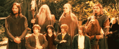 A Group Of Men Are Standing Next To Each Other In A Line . GIF
