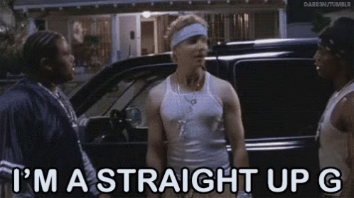 A Group Of Men Are Standing Next To Each Other In Front Of A Car And Talking . GIF