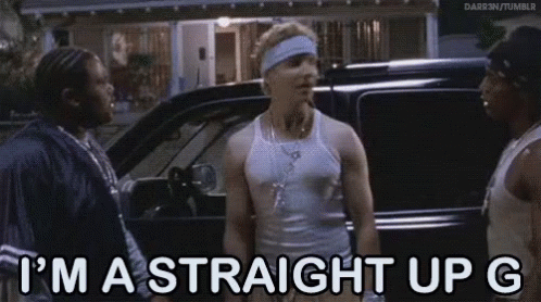 A Group Of Men Are Standing Next To Each Other In Front Of A Car And Talking . GIF