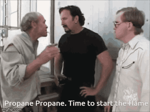 A Group Of Men Are Talking About Propane Propane GIF