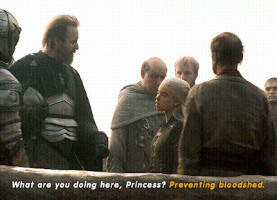 a group of men are talking to a princess who is asking them what they are doing