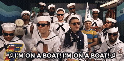 A Group Of Men Dressed As Sailors With The Words I 'M On A Boat Below Them GIF