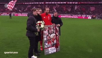A Group Of Men Holding A Sign That Says 500 GIF