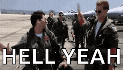 A Group Of Men In Military Uniforms Are Standing On A Runway With The Words Hell Yeah Written In White GIF