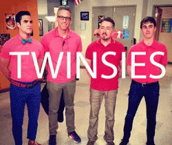 A Group Of Men In Pink Shirts With The Word Twinsies On Them GIF