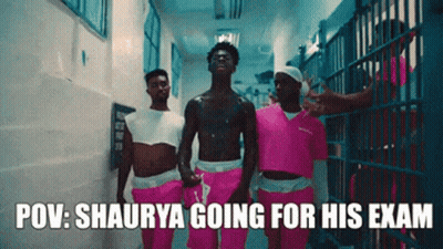 A Group Of Men In Pink Shorts Are Walking Down A Hallway With The Caption Pov : Shaurya Going For His Exam GIF