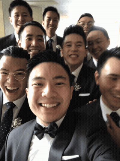 A Group Of Men In Suits And Ties Are Posing For A Photo GIF
