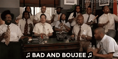 A Group Of Men In Suits And Ties Are Sitting Around A Table And Playing Instruments . GIF