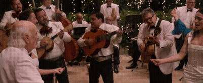 A Group Of Men In Tuxedos Are Playing Instruments GIF