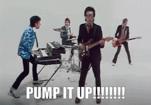 A Group Of Men Playing Musical Instruments With The Words Pump It Up Written Below Them GIF