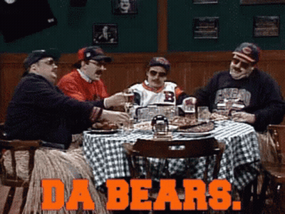 A Group Of Men Sitting At A Table With The Words Da Bears Written On The Bottom GIF
