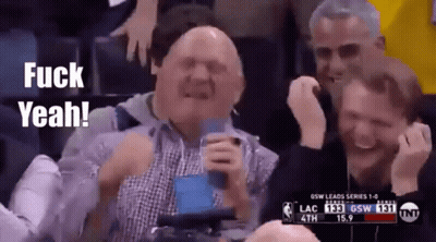 A Group Of Men Sitting In A Stadium With The Words Fuck Yeah GIF
