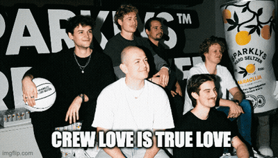 A Group Of Men Sitting In Front Of A Can Of Sparkly 'S Hard Seltzer GIF