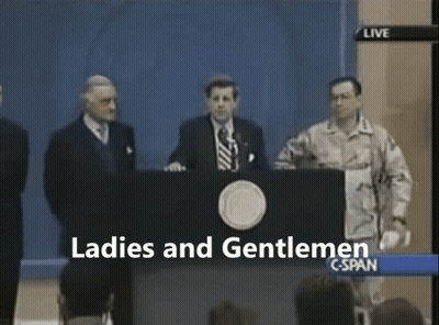 A Group Of Men Standing Behind A Podium With The Words Ladies And Gentlemen On The Screen GIF