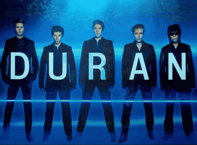 A Group Of Men Standing In Front Of A Blue Background With The Word Duran On It GIF