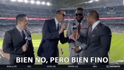 A Group Of Men Standing In Front Of A Screen That Says Bien No Pero Bien Fino On It GIF