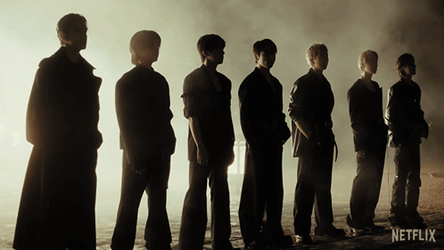 A Group Of Men Standing Next To Each Other With The Word Netflix On The Bottom GIF