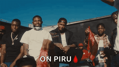 A Group Of Men Standing Next To Each Other With The Words On Piru Written On The Bottom GIF