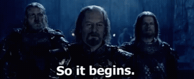 A Group Of Men Standing Next To Each Other With The Words `` So It Begins . '' GIF