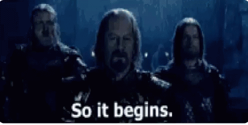 A Group Of Men Standing Next To Each Other With The Words `` So It Begins '' Written On The Screen . GIF