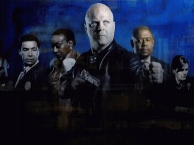 A Group Of Men Standing Next To Each Other With The Words " The Shield " On The Bottom GIF