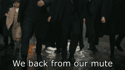 A Group Of Men Walking With The Words We Back From Our Mute Written Below Them GIF
