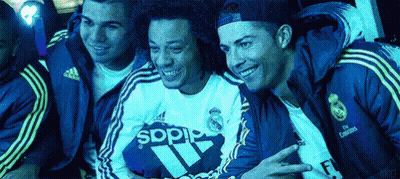 A Group Of Men Wearing Adidas Jackets Are Posing For A Picture Together GIF