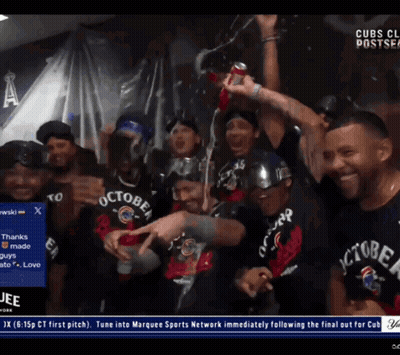 A Group Of Men Wearing October Shirts Are Standing Together GIF
