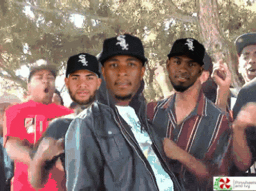 A Group Of Men Wearing White Sox Hats GIF