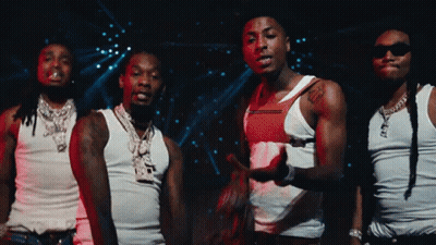 A Group Of Men Wearing White Tank Tops And Sunglasses GIF