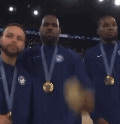 A Group Of Men With Medals Around Their Necks Are Standing Together GIF
