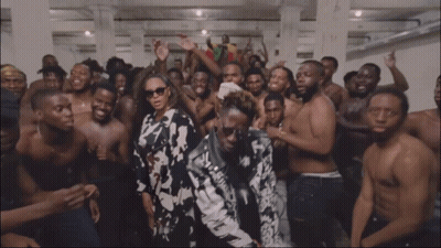 A Group Of Men Without Shirts Are Posing For A Photo GIF