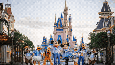 A Group Of Mickey Mouse And Friends Are Standing In Front Of The Castle GIF