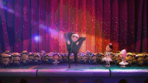 A Group Of Minions Are Dancing On A Stage With A Man Pointing Up GIF