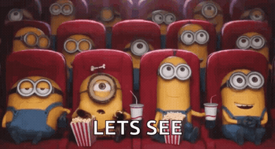 A Group Of Minions Are Sitting In A Theater With Popcorn And Drinks . GIF