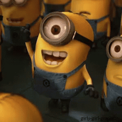 A Group Of Minions Are Standing In A Line And One Of Them Is Smiling GIF