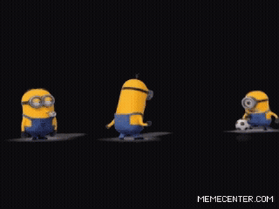A Group Of Minions Are Standing Next To A Soccer Ball GIF