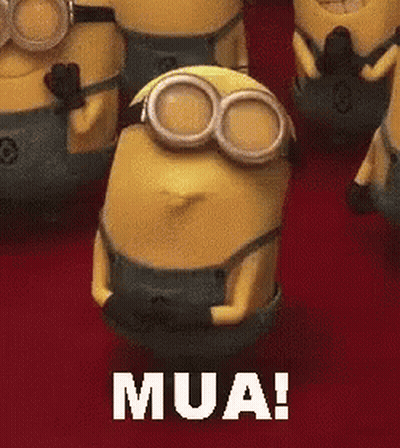A Group Of Minions Are Standing Next To Each Other And One Of Them Is Wearing Goggles And Saying Mua . GIF